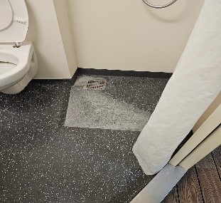 Soaps and other liquids on shower floors